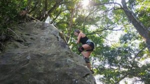 climbing a rock at wuliaojian